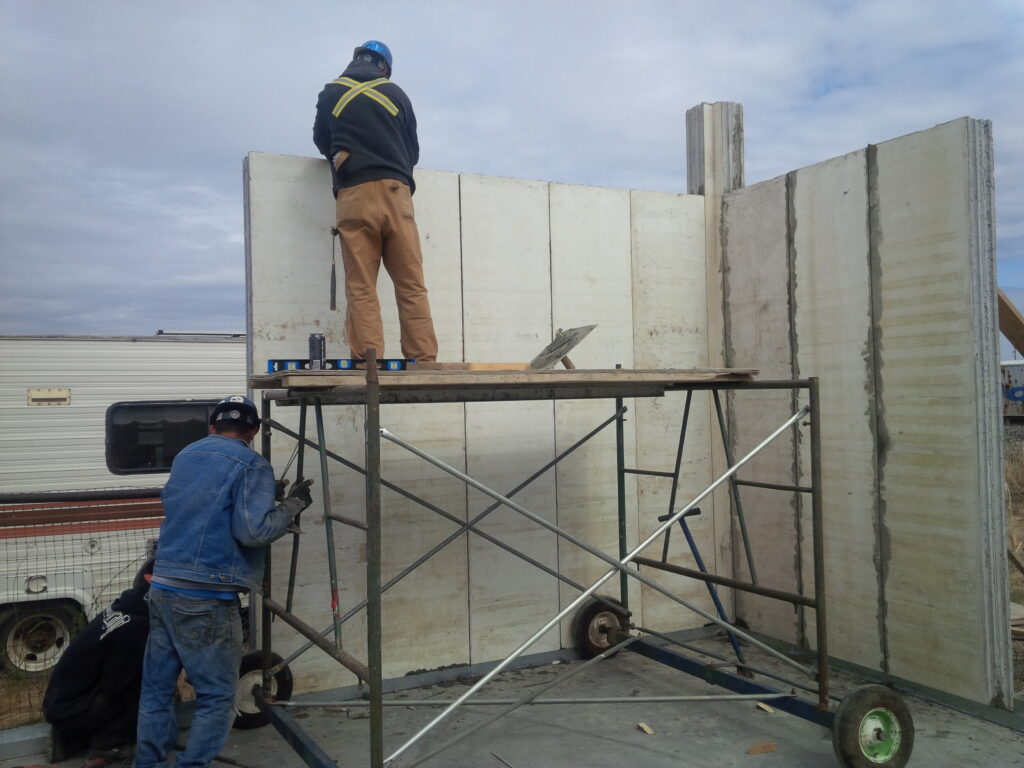 workers building a wall