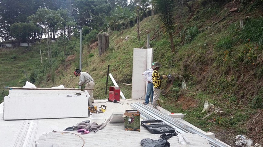 workers building a house foundation